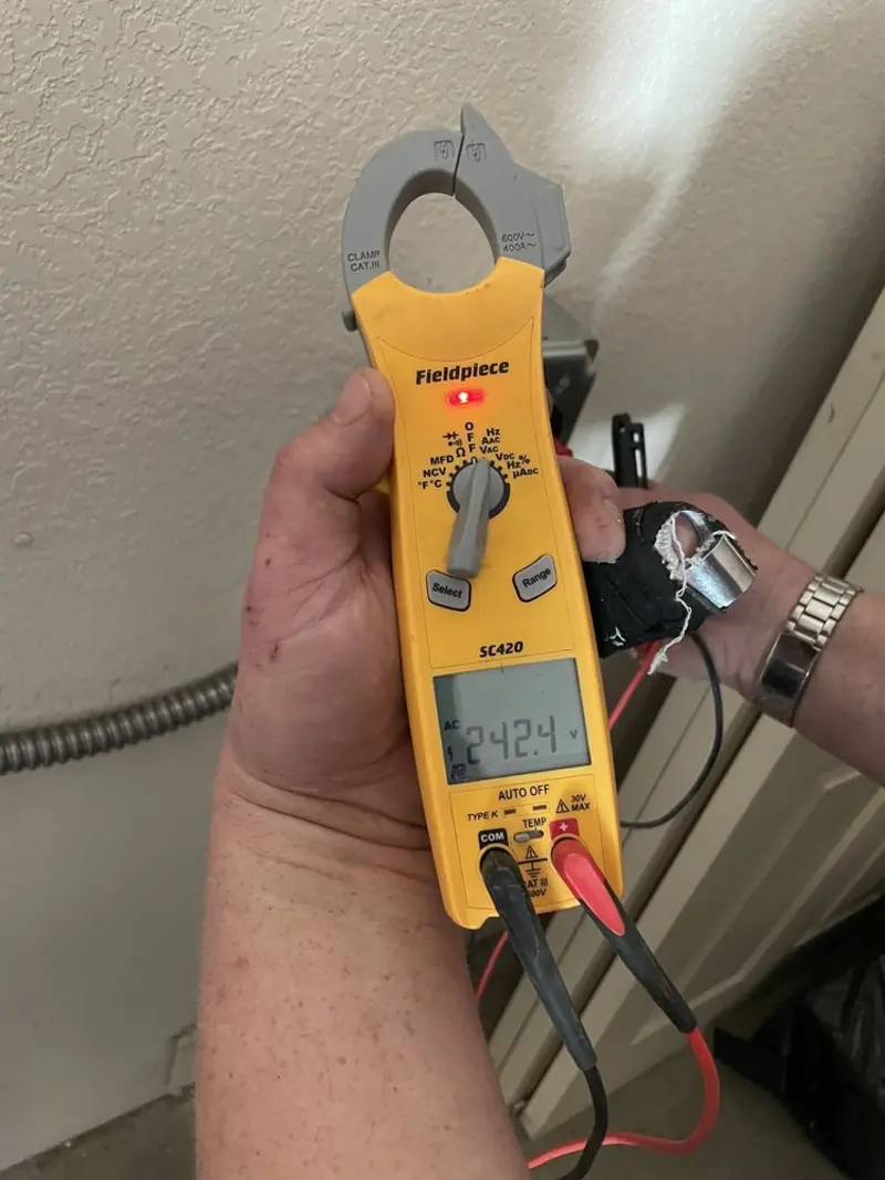 Voltage testing with clamp meter during Electrical Installation Services in Hood River